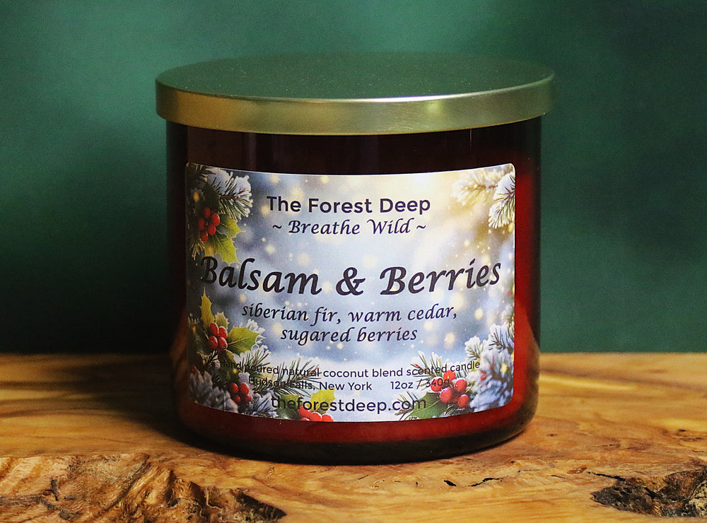 “Balsam & Berries candle by The Forest Deep with winter berry and evergreen label”