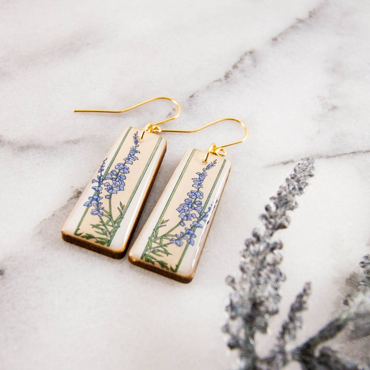 Vintage Art Deco delphinium wooden earrings with blue lavender flowers, green stems and gold-filled ear wires