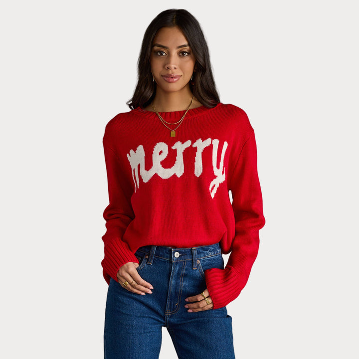 Red knit holiday sweater with white “Merry” text and long sleeves.