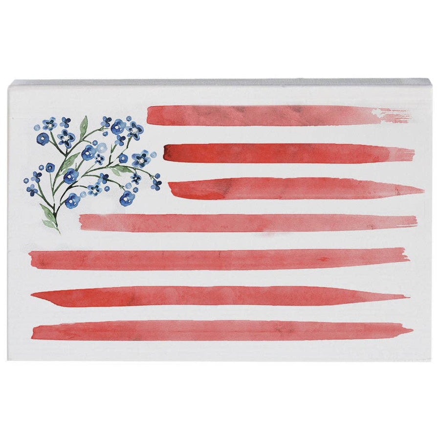 American flag with blue flowers on a white background