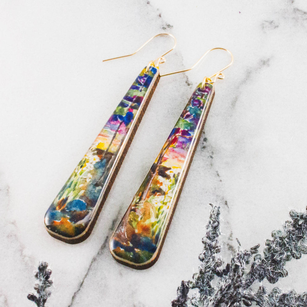 Painted sunset long wood statement earrings with colorful garden landscape design and gold-filled ear wires