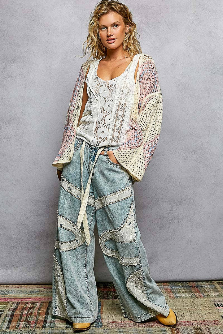 Crochet granny square cardigan with open front and relaxed fit