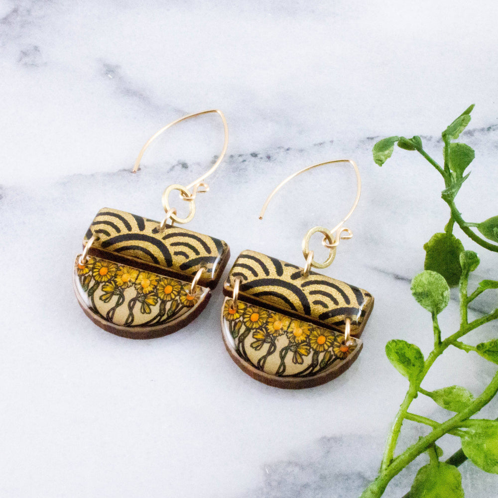 Art Nouveau sunflower stacked half circle wooden earrings with golden floral artwork and black wave pattern