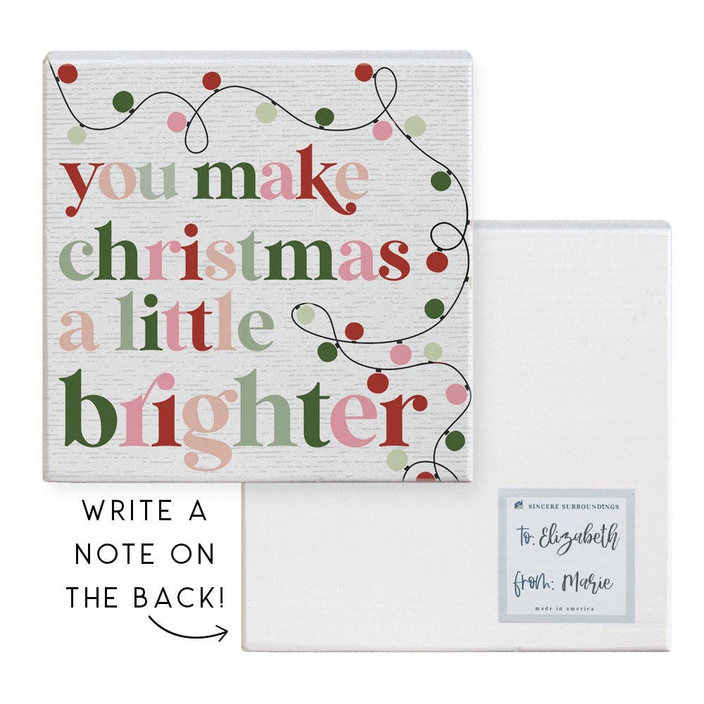 wood gift block with “You Make Christmas a Little Brighter” text and string lights design