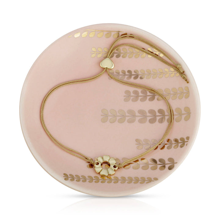 Gold plated flower & beige cord bracelet with gold heart accent and trinket dish gift set with pink floral design 