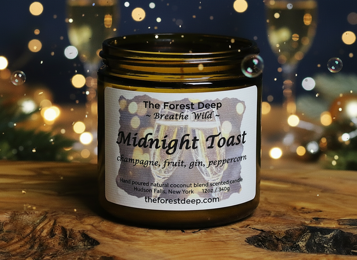 “Midnight Toast candle by The Forest Deep with champagne-inspired label”
