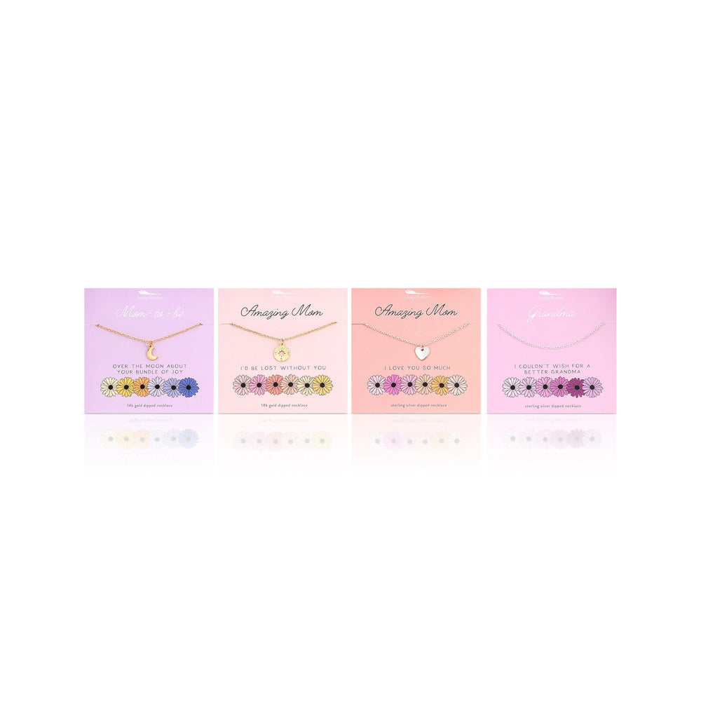 Set of four necklace boxes with floral designs on a white background